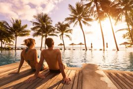 Couple,Enjoying,Beach,Vacation,Holidays,At,Tropical,Resort,With,Swimming